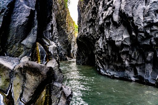 Gole dell'Alcantara, Messina, Sicilia, Italy. blue River and Lava rocks