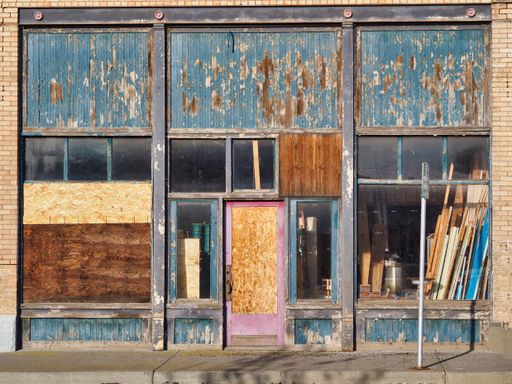 A shot of an old worn abandoned building facade