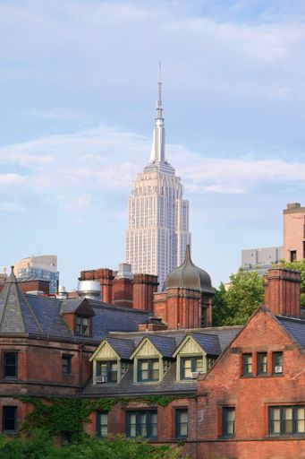 The Empire State Building in New York City seen from old buildings.