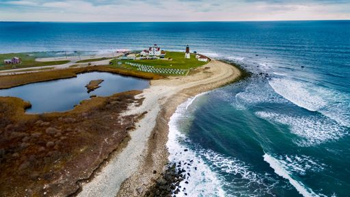 A picturesque view of the Point Judith Lighthouse in Narragansett, Rhode Island