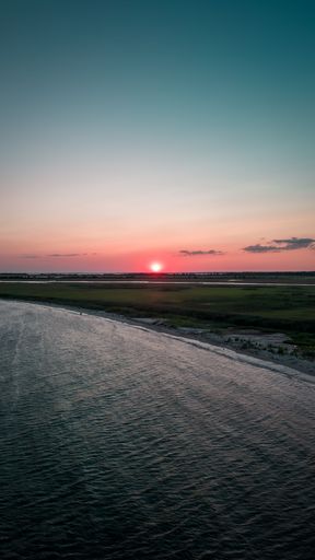 An aerial view of a beautiful sunset over Thompsons Beach in southern New Jersey