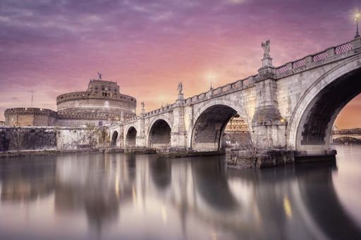 Saint Angelo castle and bridge over the Tiber river in Rome, Italy.