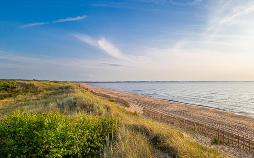 This the beautiful Sandy dunes of the beach in Angelholm Sweden. But it could look like a beach in Denmark too