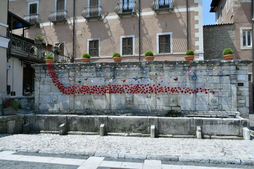 An ancient fountain in a medieval town in the Abruzzo region.