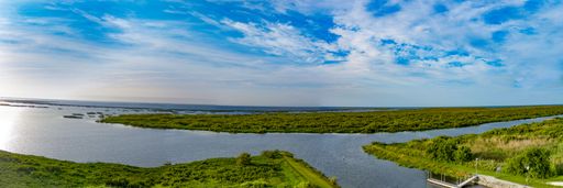 An view of Lake Okeechobee surrounded by lush greenery in Florida, the United States
