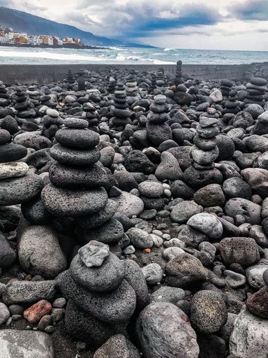 Tenerife is the largest of the Canary Islands in Spain, facing West Africa. It is dominated by Mount Teide, a dormant volcano.