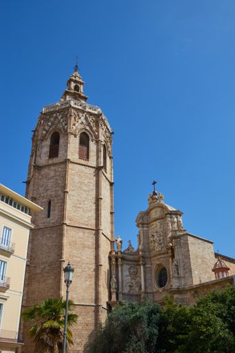Vertical Wide angle shot of the amazing Torre del Micalet on a bright cloudless day in Valencia Spain from a distance
