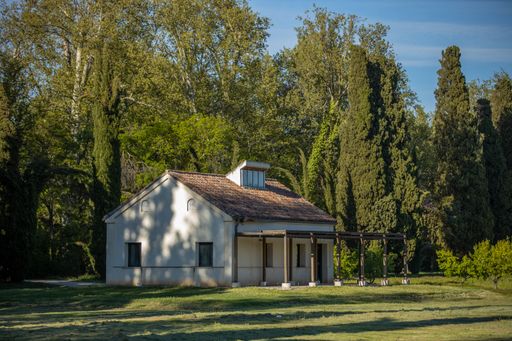 A view of a cozy house in the picturesque green countryside