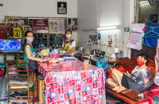 three Thai women work in a sewing room in Pattaya District Chonburi Thailand during the Covid 19 virus crisis