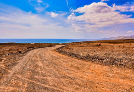 A curvy pathway in a desert area in the Canary Islands, Spain