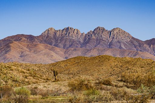 The image shows a view of Four Peaks, an iconic mountain in the Phoenix area which  was mentioned by  early Spanish explorers