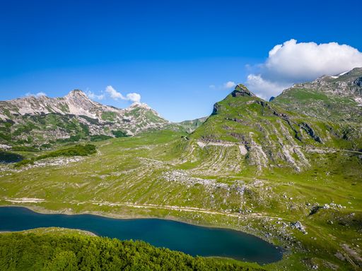 A scenic view of the serene Lake Modro in Durmitor National Park in Montenegro