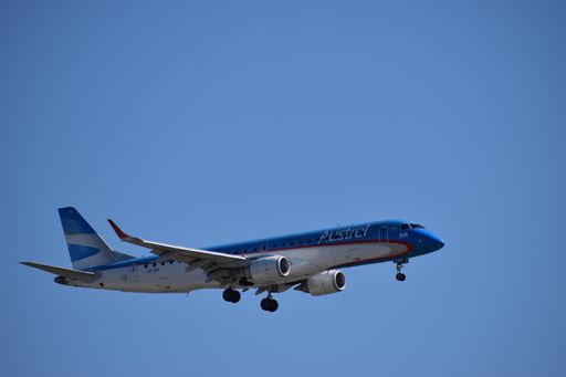 Embraer 190 aircraft of Austral Lineas Aereas approaches Aeroparque Jorge Newbery airport, Buenos Aires.