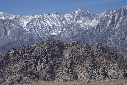 A beautiful shot of majestic mountain rocks under the blue sky