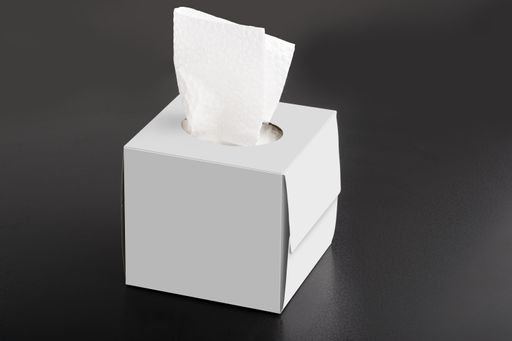 A cubical tissue box on black background, editable mock-up series template ready for your design, faces selection path included.