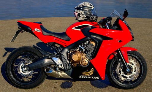 Red Honda Bike in a Drift circle