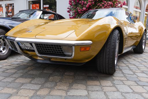 A pristine golden 1976 Chevrolet Corvette Stingray is displayed at a classic car show in Preetz, Germany on August 07, 2022