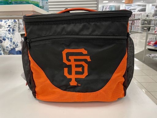A close up photo of the New S.F. Giants Team black and orange colored zip up carry hand bag on store shelf