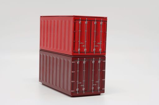 A stack of red shipping containers against a white background