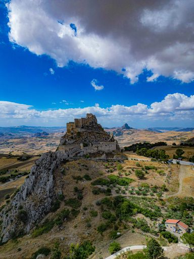 A vertical shot of Mussomeli, Castello manfredonico under the blue sky