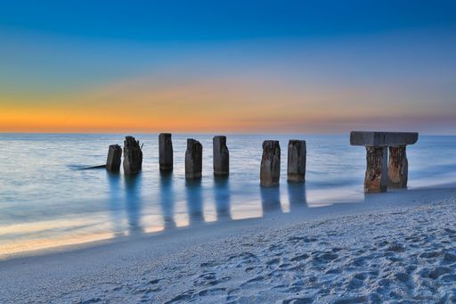 An old broken pier on the Florida island of Boca Grande just after sunset.