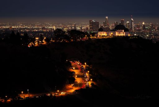 A scenic view of the historic Griffith Observatory in Los Angeles, California at night