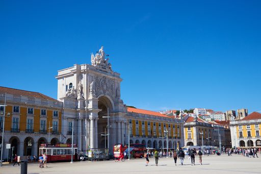 Horizontal shot from the side of the Arco da Rua Augusta in lisbon portugal during a bright hot sunny day
