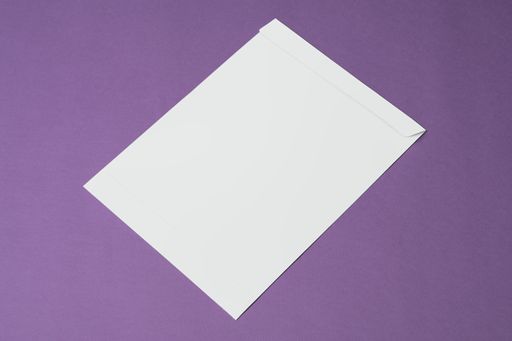 An A4 paper envelope isolated on a purple background