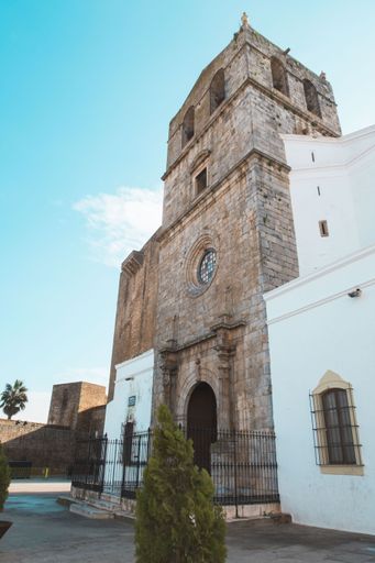 A vertical low angle shot of a historic church tower in Monsaraz, Portugal