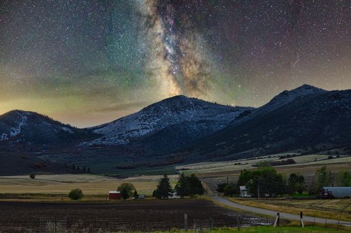 The Milky Way in a starry night above mountains