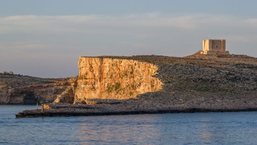 The small Mediterranean island of Comino, situated between the two larger islands of Malta and Gozo.
