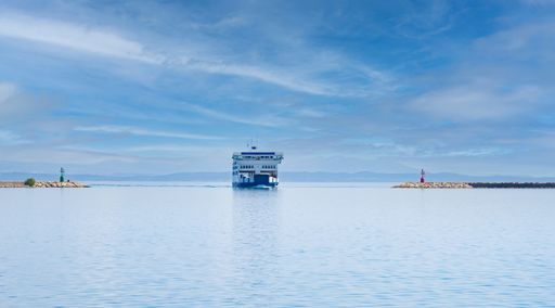 ferry at the entrance to the port, carloforte, south sardinia