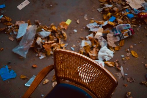 A top view of a wooden chair in an abandoned place