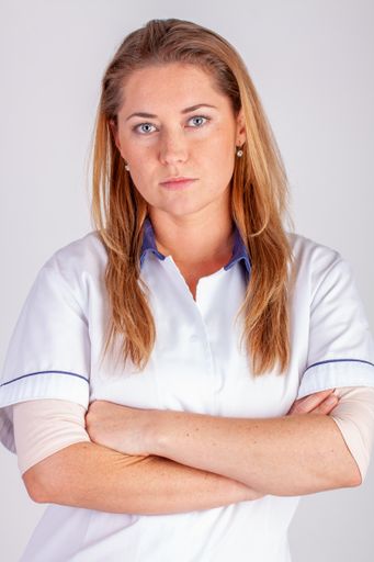 Caucasian woman wearing white clothes having a medical profession