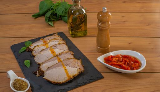 roasted pork loin with spices olive oil and peppers