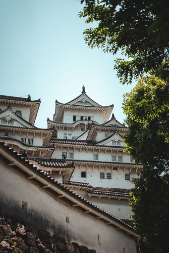 A vertical shot of the Himeji Castle in the daylight in Japan