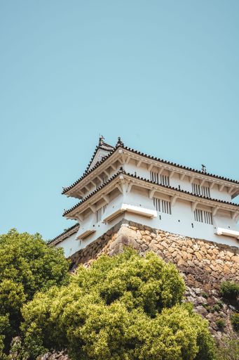 A vertical shot of the Himeji Castle in the daylight in Japan