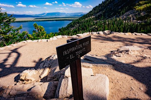 A scenic view of Jenny Lake in Grand Teton National Park, Wyoming in the summertime.