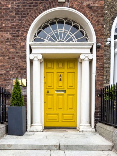 A famous yellow painted Georgian door in Dublin, Ireland