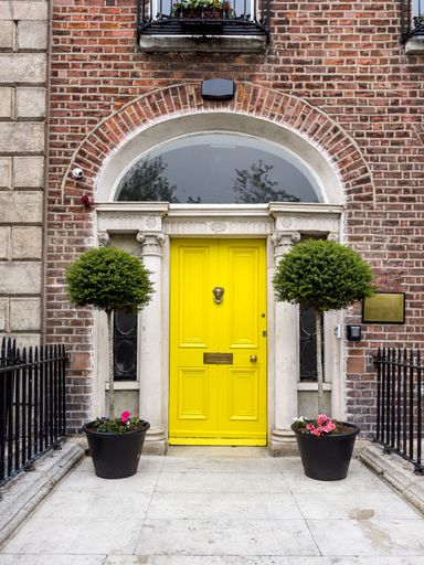 A famous yellow painted Georgian door in Dublin, Ireland