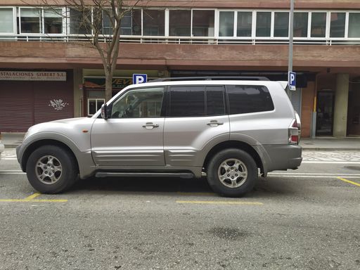 Barcelona, Spain; March 5, 2021: Old version of the gray Mitsubishi Montero or Pajero parked on the street