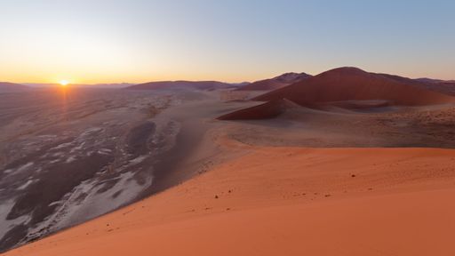 A scenic view of sunset over Namib desert at Naukluft National Park in Namibia