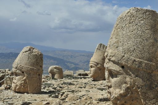A scenic view of the famous Manheads in Mount Nemrut in Turkey against  a gloomy sky