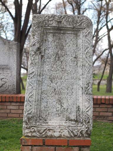 A soft focus of an old tombstone originating from the Roman empire