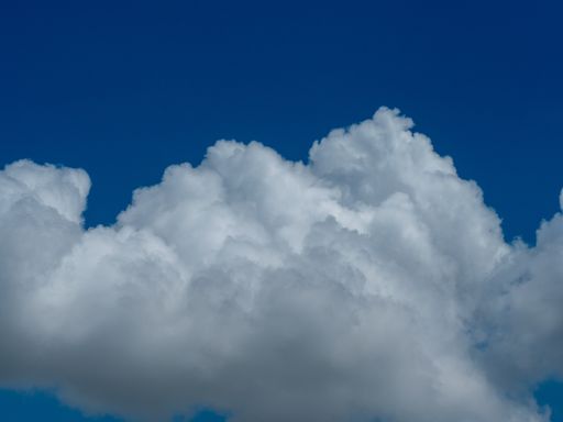 A closeup shot of the blue sky with white clouds - perfect for background