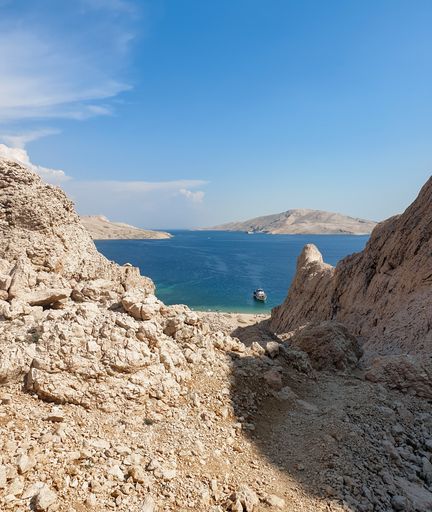 View of Beritnica beach on Pag island in Croatia. Popular tourist destination with amazing rock formations and beautiful coastline.