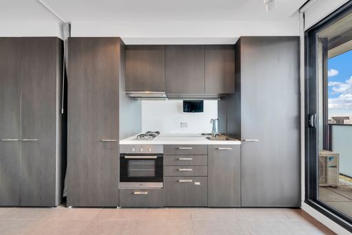 A black, modern kitchen furniture of a modern house