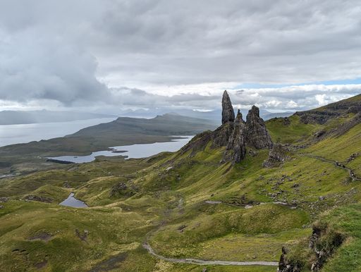An aerial view of a rocky mountain landscape with the Old Man of Storr, on the Isle of Skye in Scotland