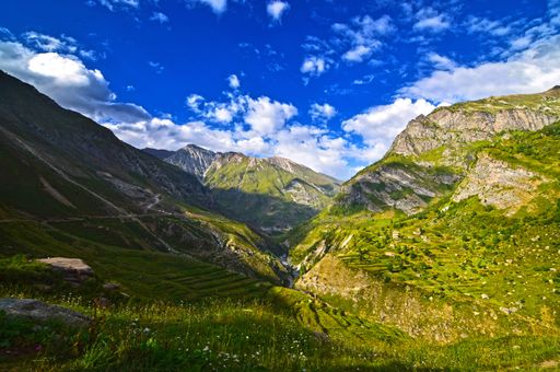 The mesmerizing views of the green landscapes against the cloudy sky in spring