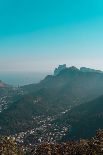 A beautiful view of tropical forest in rio de janeiro brazil with a clear blue sky in the background